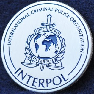 INTERPOL 100 years of International Police Cooperation Silver
