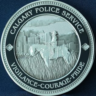 Calgary Police Service - Vigilance Courage Pride Red